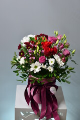 fresh flowers in paper boxes