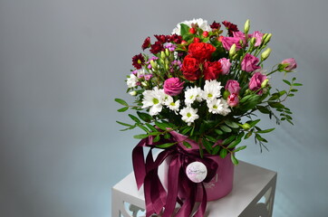 fresh flowers in paper boxes