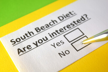 Obraz premium One person is answering question about south beach diet.