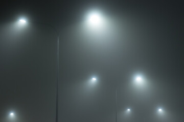 fog lit by lanterns
