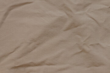 Fototapeta na wymiar Brown fabric texture for clothes.