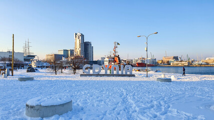 The inscription 'Gdynia' in the wharf in winter time, Gdynia, Poland