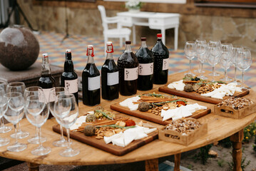 welcome buffet with alcohol and snacks, sandwiches, cupcakes