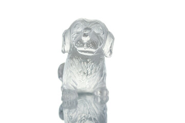 beautiful statuette of a dog from the mineral topaz on a white background