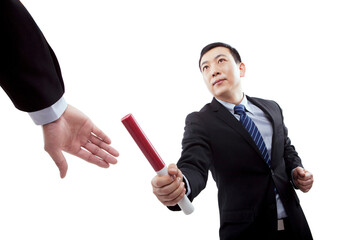 Business people in passing the baton