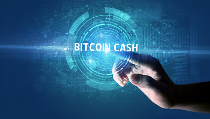 Hand touching BITCOIN CASH button, modern business technology concept