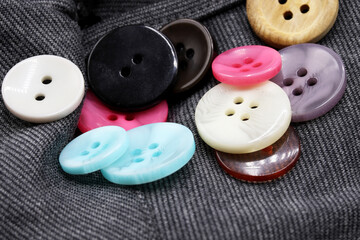 colorful buttons on fabric background