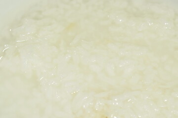 close up of boiled rice in bowl background and texture