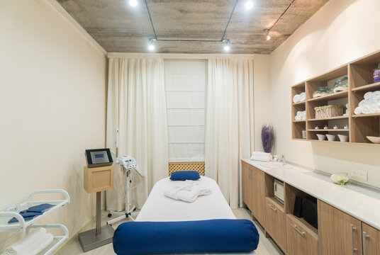 Interior of a modern massage room in a spa salon