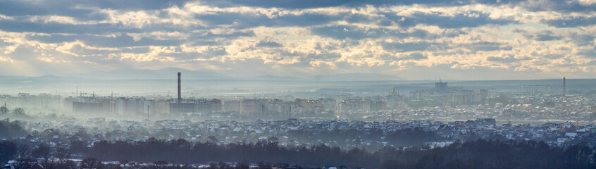 Fototapeta na wymiar Ivano-Frankivsk city in haze on a winter day