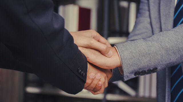 Businessman Making Handshake Hand Supporting Give Empathy Care, Job Interview In The Meeting Room At The Office, Congratulation Connection Concept.