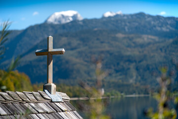 Wooden cross on a boathouse at the Lake Grundlsee in the Salzkammergut in  Styria, Austria.