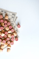 Family Lotto board game. Cards and barrels with numbers.