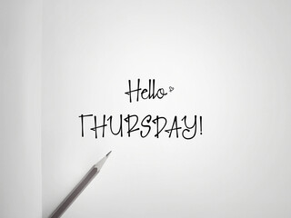 Fototapeta premium Inspirational Concept - 'hello thursday' text in vintage background. Stock photo.
