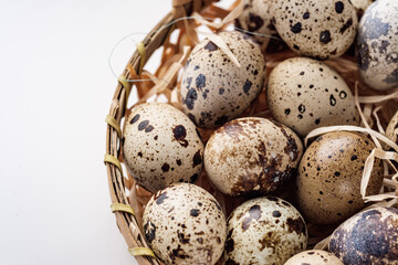 Obraz premium fresh quail eggs on a white acrylic background