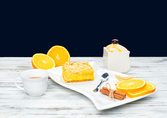 Hot tea with a mug spoon oops orange slices and sugar. Cozy home tea concept