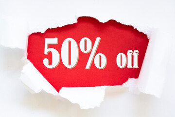 paper torn with word of 50% OFF