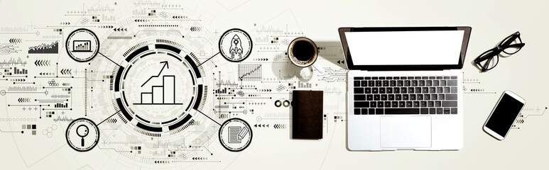 Business growth analysis with a laptop computer on a desk