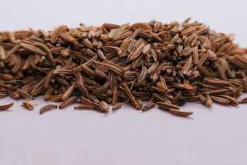 Cumin, caraway seeds. Macro shot, shallow focus
