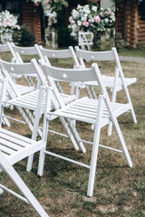 white chairs in the garden