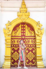 Woman next to a door