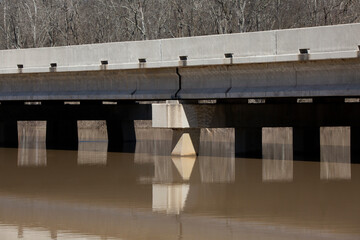 Concrete Bridge through Swamp Water