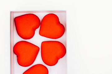 red heart in a box. Red hearts in a white box . Give a heart. Valentine's day 