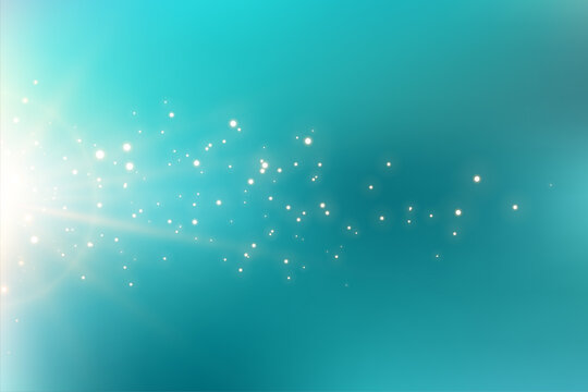 turquoise background with sparkling light flare effect