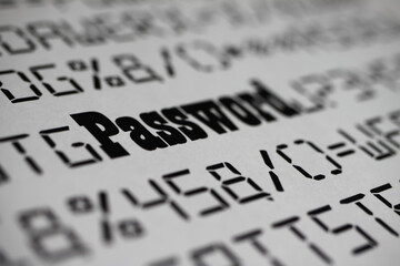 Close up of fictive letters and special characters with blurred word password, white background  -...