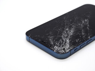 Photo of blue smartphone with broken damaged display. Modern smartphone with damaged glass screen...