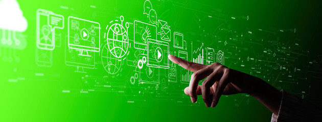 Digital marketing with person hand using a smart computer on green background.