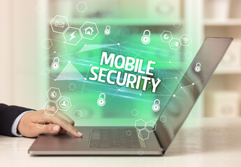 MOBILE SECURITY inscription on laptop, internet security and data protection concept, blockchain and cybersecurity
