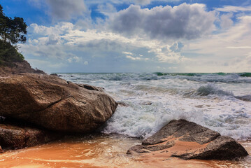 tropical beach under gloomy sky