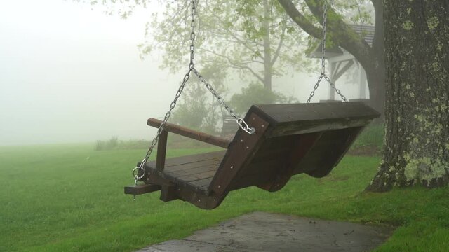 bench swing in the fog