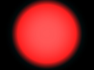 Large red circle on a black background.
