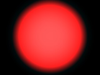 Large red circle on a black background.