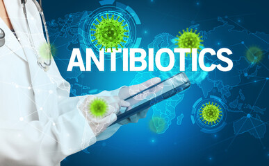 Doctor fills out medical record with ANTIBIOTICS inscription, virology concept