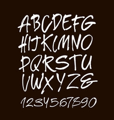 Vector Acrylic Brush Style Hand Drawn Alphabet Font. Calligraphy alphabet and numbers on a black background