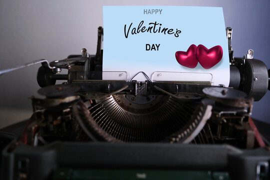 old typewriter, heart model, background for design, concept of marriage proposal, Valentine's Day, greeting concept