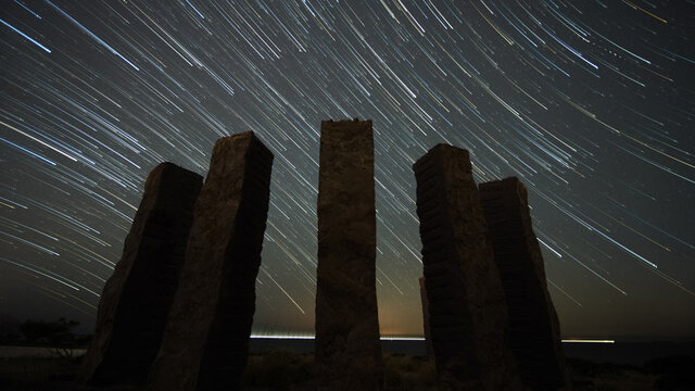 Low angle shot of Can Solei Ibiza clock under a beautiful starry sky