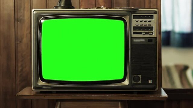 Vintage Television Set Green Screen Background. Zoom In. You can replace green screen with the footage or picture you want with “Keying” effect in After Effects. 4K Resolution.
