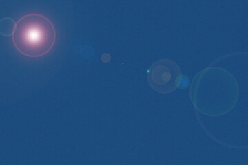 Blue background, denim jeans background. Digital Natural lens flare..
