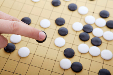 Business people playing go