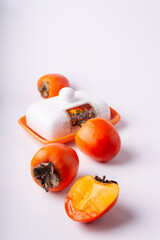Persimmon on a white background.