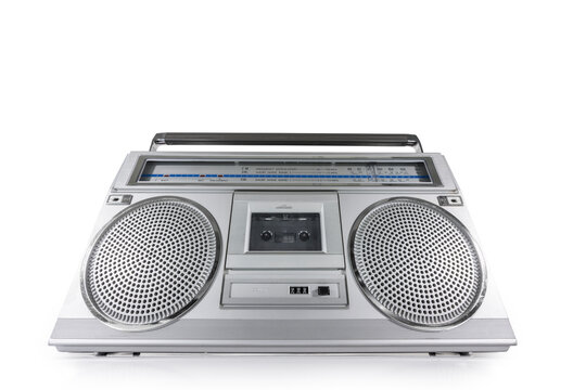 Vintage boombox style FM and short wave radio, stereo cassette tape player and recorder on white. 
