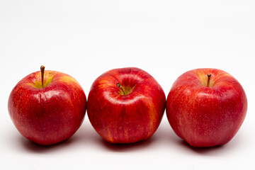Red apples isolated in white background