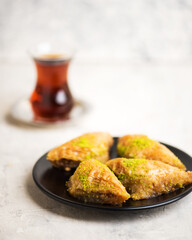 BAKLAVA. Traditional Turkish Desserts Baklava with Turkish Tea.