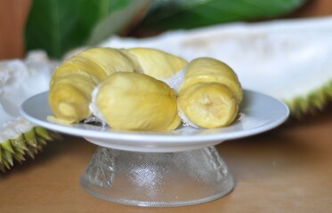 durian fruit flesh on a white plate