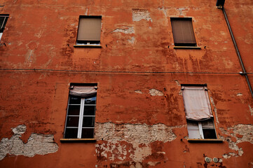 Fototapeta na wymiar Italian window on the brick wall