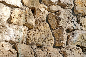 Masonry stone wall.